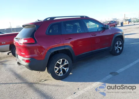 2014 Jeep Cherokee Trailhawk from USA, damaged, VIN 1C4PJMBSXEW207646
